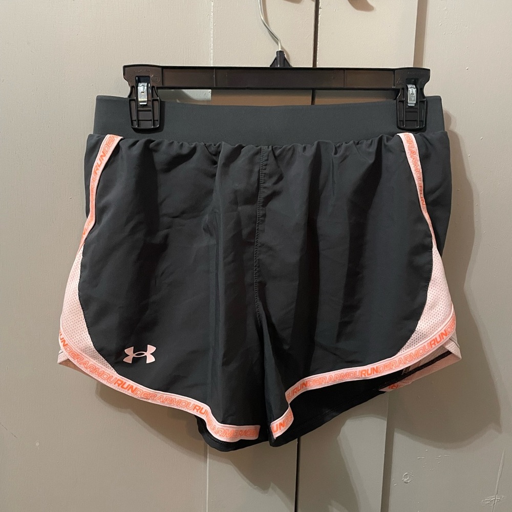 Peach and dark grey under armour running shorts